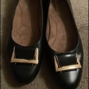 Black leather aerosole flats